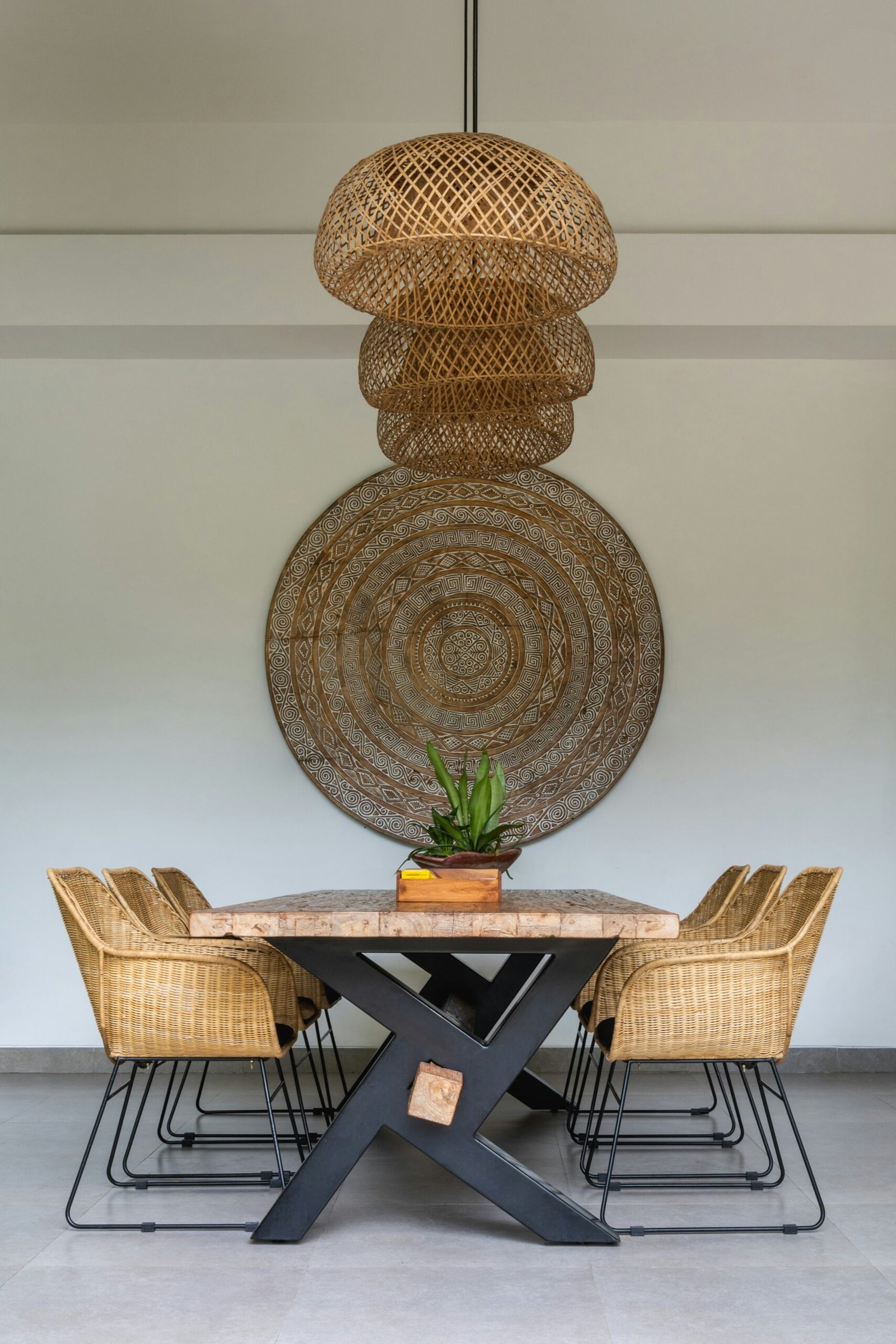 A dining room with a table and chairs